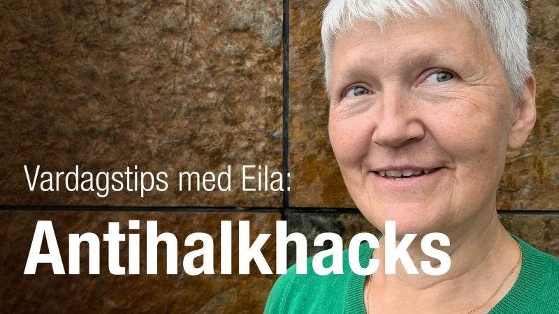 Eila har kort, grått hår och står framför en rostbrun vägg. Hon ser glad ut.